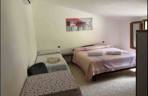 Calangianus House | Holiday Home 'Tra Montagna e Mare' with Mountain View, Private Terrace and Wi-Fi