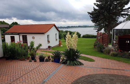 Altefaehr House | Holiday home waterfront with terrace