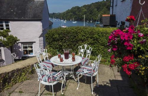 Dittisham House | Holly Cottage - characterful cottage a stones throw from river Dart with front & back patios