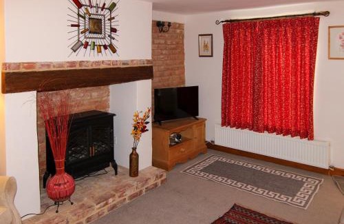 Docking House | Hollyhocks Cottage