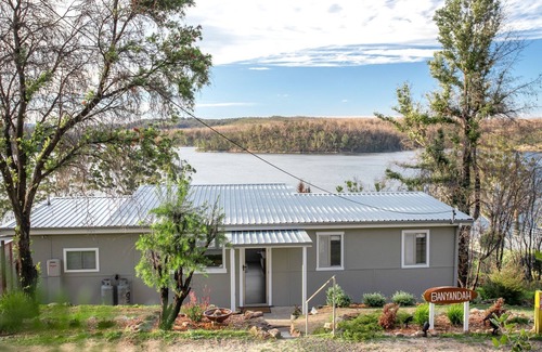 Lake Conjola House | Home On the Water Enjoy a relaxing lakeside hideaway at this charming and cosy