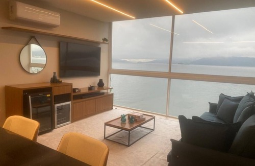 Mambucaba Apartment | Home Sweet Sea. Beachfront Retreat: Luxury, Comfort and Exclusive SPA