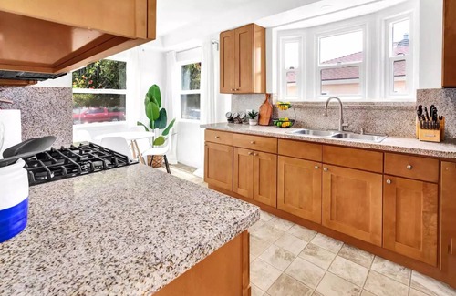 East Los Angeles House | Home with Guest House : Parking : Hot Tub : Pet-friendly : EV Charger : King Bed