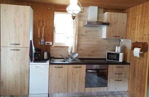Vaas Ski Chalet | Homerez - Cozy Chalet in Vaas with Lake View