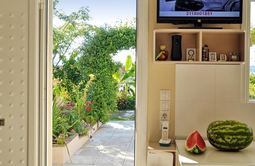 Perama House | Homerez - Nice house 500 m away from the beach for 4 ppl. with garden at Corfu