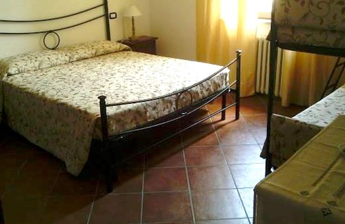 Monticello Amiata Apartment | Homerez - Spacious apartment with garden and balcony