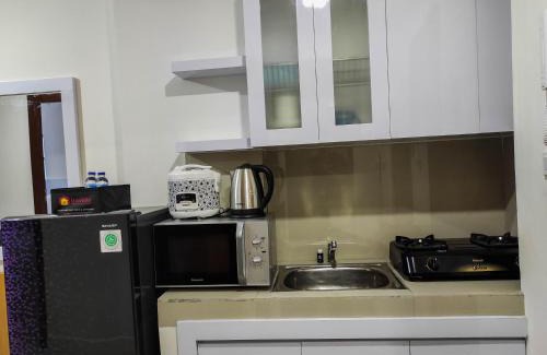 Panakkukang Apartment | Homey and Comfy 2BR at Vida View Apartment By Travelio