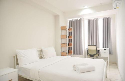 Depok Apartment | Homey and Minimalist 1BR Cinere Bellevue Suites Apartment By Travelio
