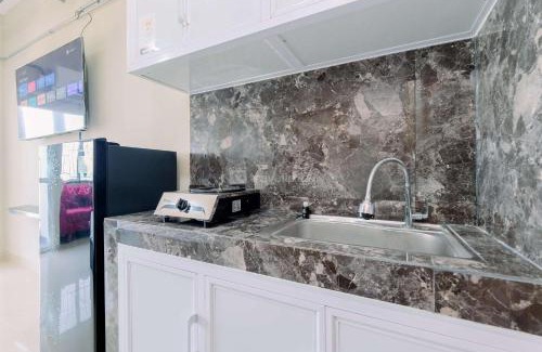 Tajur Halang Apartment | Homey and Restful Studio Royal Sentul Park Apartment By Travelio