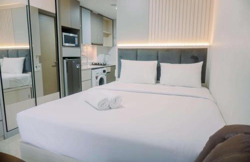Pantai Indah Kapuk Apartment | Homey and Warm Studio at 28th Floor Gold Coast Apartment By Travelio