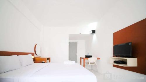 Surabaya Apartment | Homey Studio Apartment at Dian Regency By Travelio