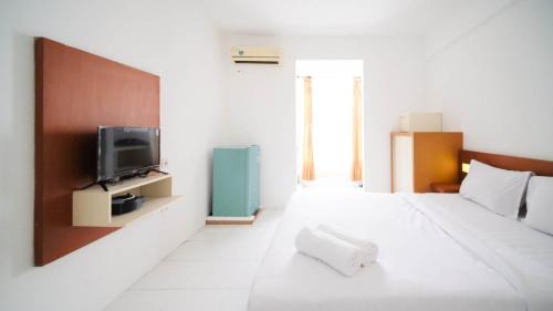 Surabaya Apartment | Homey Studio Apartment at Dian Regency By Travelio