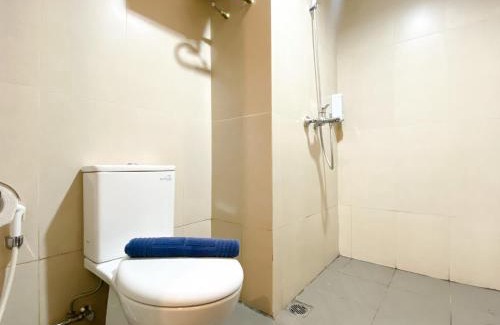 Duren Sawit Apartment | Homey Studio No Kitchen at Gateway Park LRT City Jatibening Apartment By Travelio