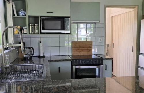 Whangamata House | Hosts on the Coast Treetops