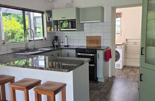 Whangamata House | Hosts on the Coast Treetops