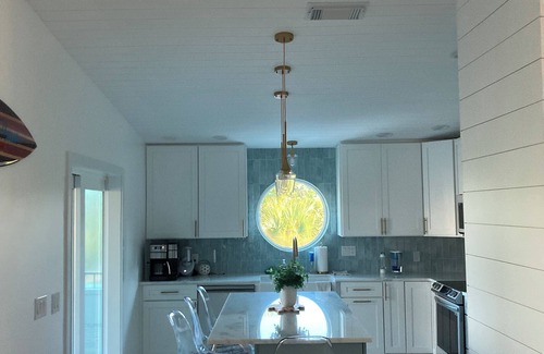 Palm Island House | Hot tub steps from the beach with private dock for fishing