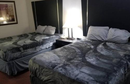 Stillwater Apartment | Hotel 2 Queen Beds Hotel Room 131 Wi-Fi