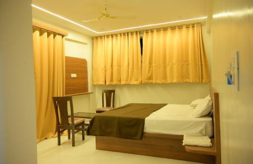 Madha Hotel | Hotel Amruta, Themburni, Madha