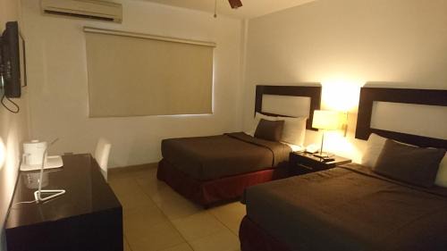 Managua Hotel | Hotel Brandts Ejecutivo Los Robles