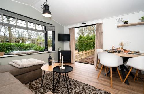 Epe Ski Chalet | Hotel chique chalet met zicht over de weilanden op de Veluwe