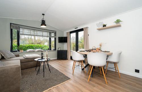 Epe Ski Chalet | Hotel chique chalet met zicht over de weilanden op de Veluwe