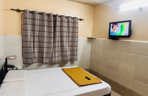 Gandhi Nagar Cabin | Hotel Lalitha Comfort