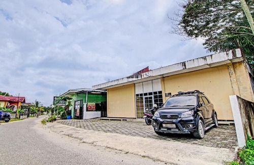 Pekanbaru Hotel | Hotel O Lucky Guesthouse