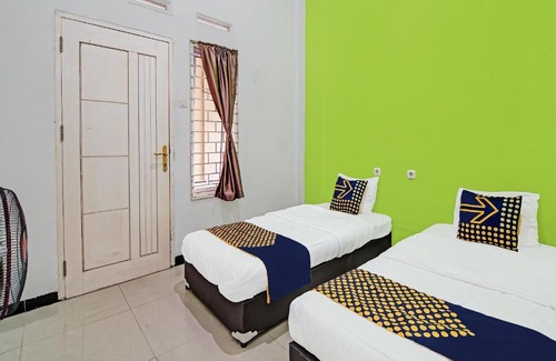 Pekanbaru Hotel | Hotel O Lucky Guesthouse