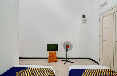 Pekanbaru Hotel | Hotel O Penginapan Puti SyariahNearBandara Sultan Syarif Kasim II