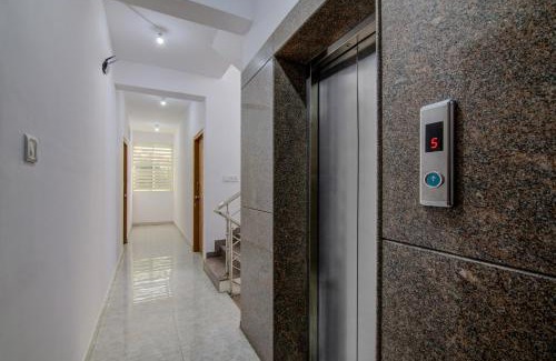 BTM Layout Hotel | Hotel O Varcity Comforts Near Ragigudda Sri Prasanna Anjaneyaswamy Temple