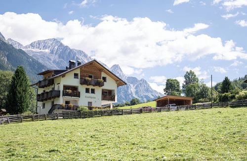 Rasun Anterselva Apartment | House Landheim Apart. Mountain view with separate bedroom and waterfall view!