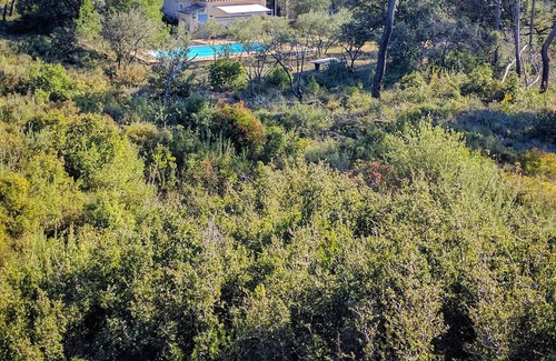 Saint-Bauzille-de-Montmel Villa | House view over cliff and olivette