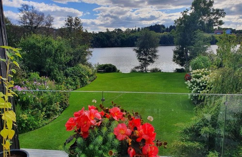 Sandnes Villa | House with big garden by water
