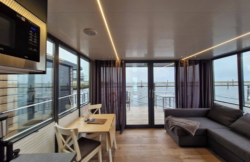 Wendtorf Boat Rental | Houseboat Fjord del Sol with bio sauna and roof terrace in Wendtorf/Kiel Fjord