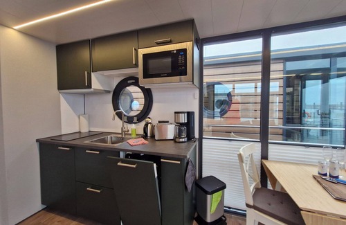 Wendtorf Boat Rental | Houseboat Fjord del Sol with bio sauna and roof terrace in Wendtorf/Kiel Fjord