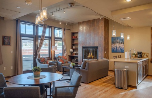 Downtown Steamboat Springs Condo | Howelsen Place A302 | Air Conditioning | Private Parking Garage | Fire Pit with Views