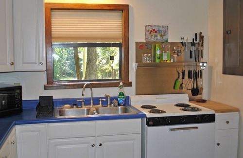 Octavia Cabin | Huckleberry Trails is a peaceful 2-bedroom cabin secluded in mountain woodlands.