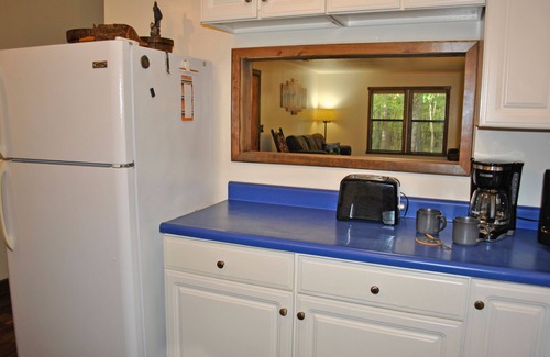 Octavia Cabin | Huckleberry Trails is a peaceful 2-bedroom cabin secluded in mountain woodlands.