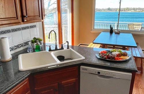 Wolf Lake House | Huge beach house! Kayaks, fire pit, game room! Gentle Sandy slope, Crystal clear