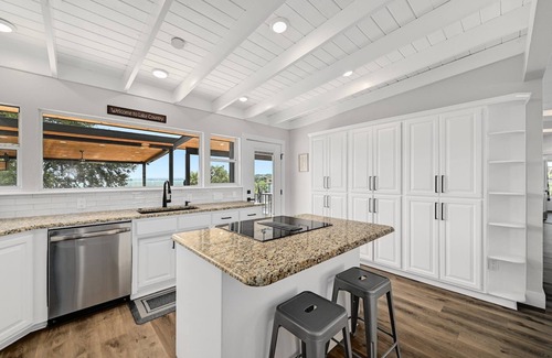 Sunrise Beach Village House | Huge Waterfront Home on Lake Lbj with Pool, HotTub, Island, Boat Ramp and Slips