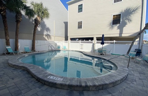 Indian Shores Condo | Huge Waterfront Condo With Heated Pool.