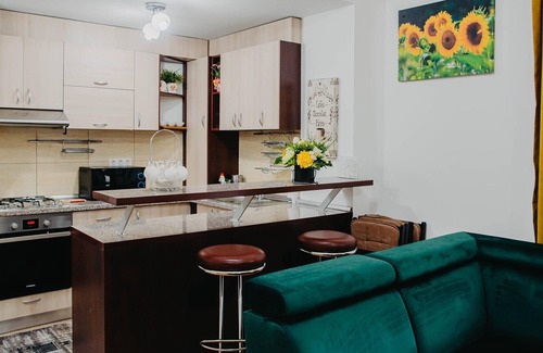 Sinaia Apartment | HugoMountain apartament is waiting for you to discover the beauty of the nature.