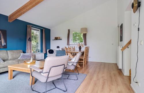 Grou House | Huis Specht is perfect voor vakantie nabij meer en tuin op zuiden