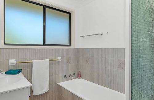 Boambee East Apartment | Humble Abode, your perfect holiday home. This two bedroom townhouse is the ideal place to relax