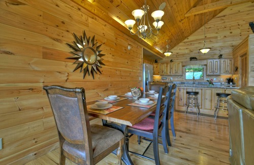 Chatsworth Cabin | Hummingbird Haven is the ultimate retreat for large groups! Enjoy pet-friendly accommodations, breathtaking mountain views, a hot tub, firepit, WiFi, and hiking