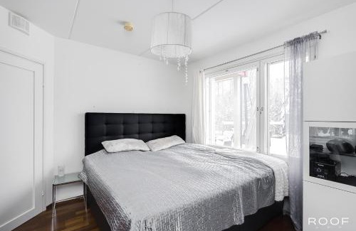 Espoo Centre Apartment | Huoneisto saunalla ja ulkoporealtaalla