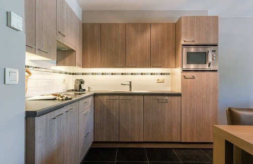 Bredene Apartment | Huswell - Bright seaside apartment with parking