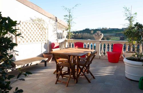 Ottiglio House | I Leoni Ruggenti Terrazza Incantata tra le Colline del Monferrato