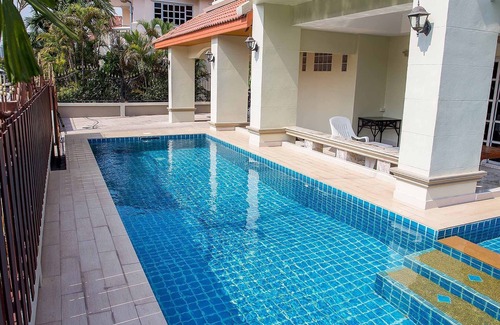 Na Kluea Villa | I-Rin poolvilla featuring its own swimming pool set in a private estate.