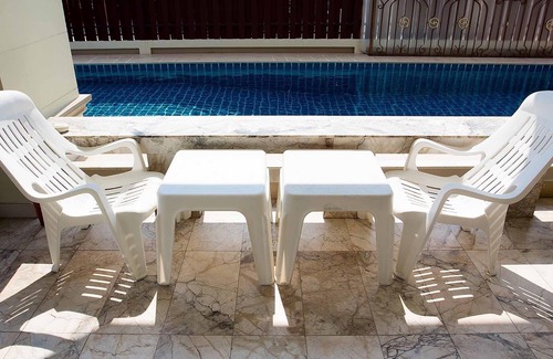 Na Kluea Villa | I-Rin poolvilla featuring its own swimming pool set in a private estate.